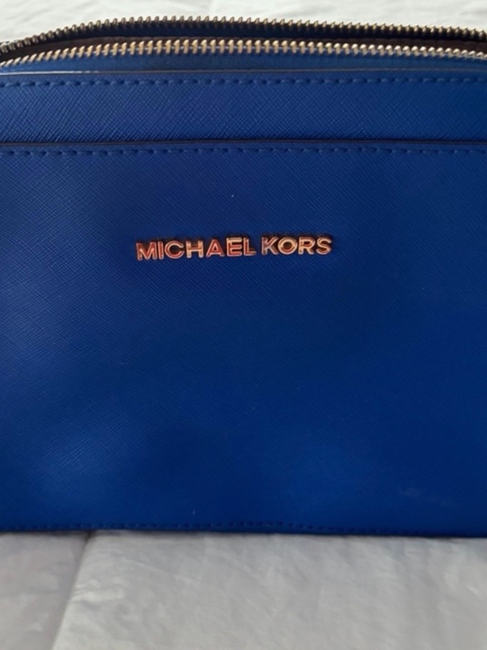 Michael Kors womans Cobalt Blue Saffiano purse with Rose Gold Logo